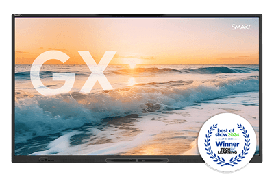 The GX-V3 display showcasing a stunning beach sunset, with the large letters 'GX' superimposed on the image. In the corner, a 'Best of Show 2024' award badge from Tech & Learning at the ISE event signifies the product's achievement.